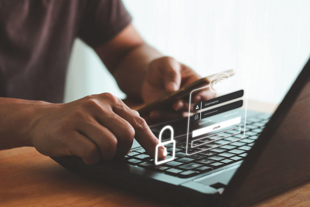 Graphic of man putting password into computer